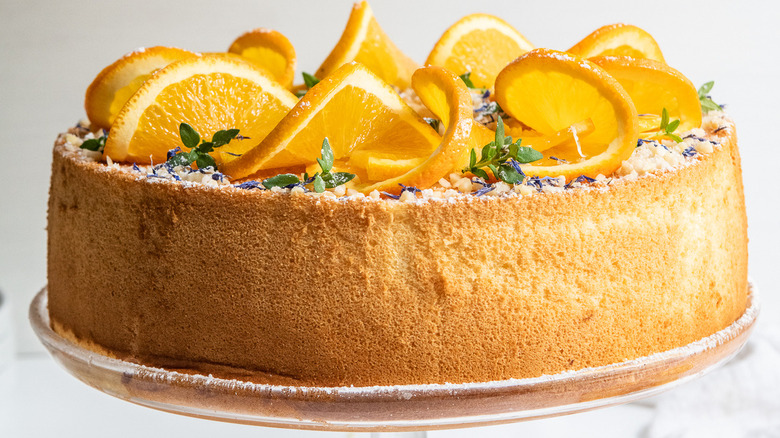 a fully baked, garnished orange chiffon cake