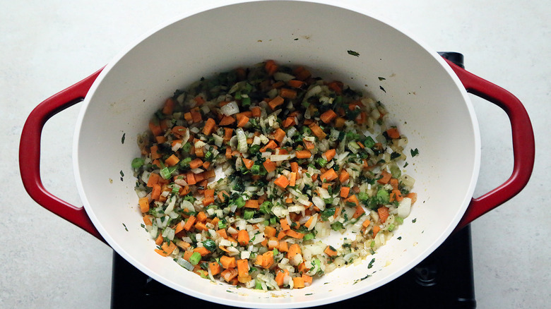 diced vegetables cooking in pot