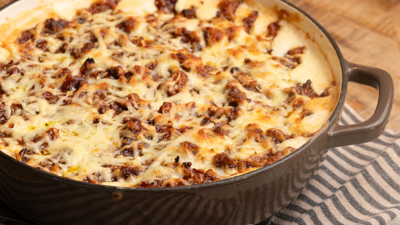 Pulled pork mac and cheese in large pot