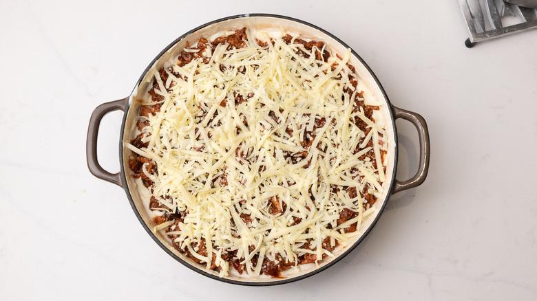 Cheese-topped mac and cheese in large pot