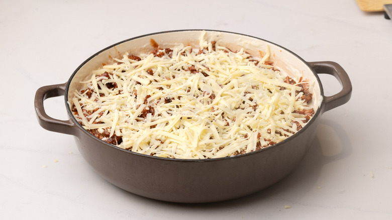 Unbaked pulled pork mac and cheese in large pot