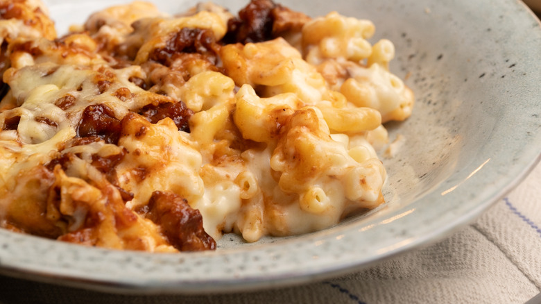 Pulled pork mac and cheese in gray bowl