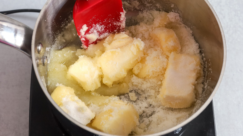 Butter and sugar in pot