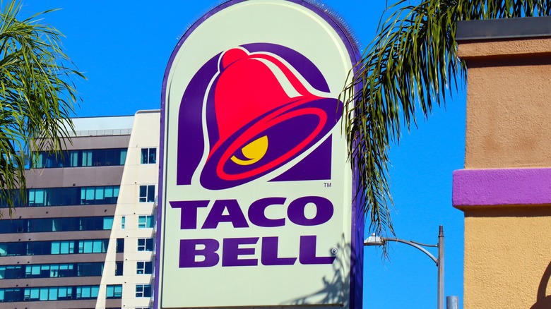 taco bell sign with blue sky