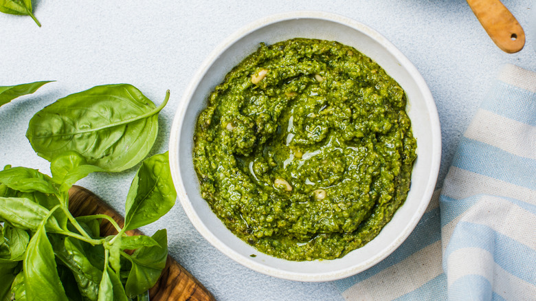 Top-view of pesto in a white bowl