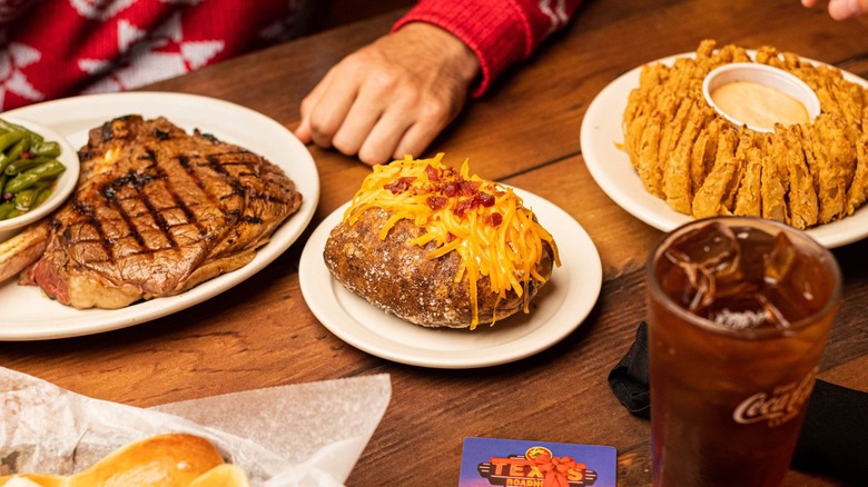 plates of food at. Texas Roadhouse