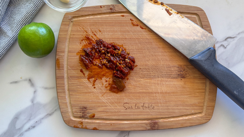 chopped pepper on board