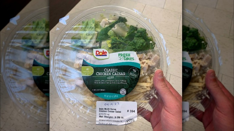 holding recalled dole chicken caesar salad