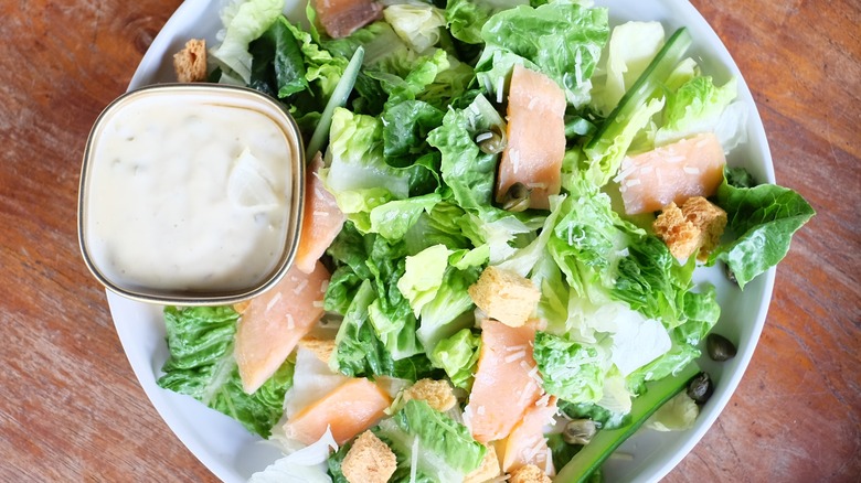 caesar salad with shredded smoked salmon