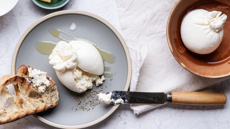 burrata on table with bread