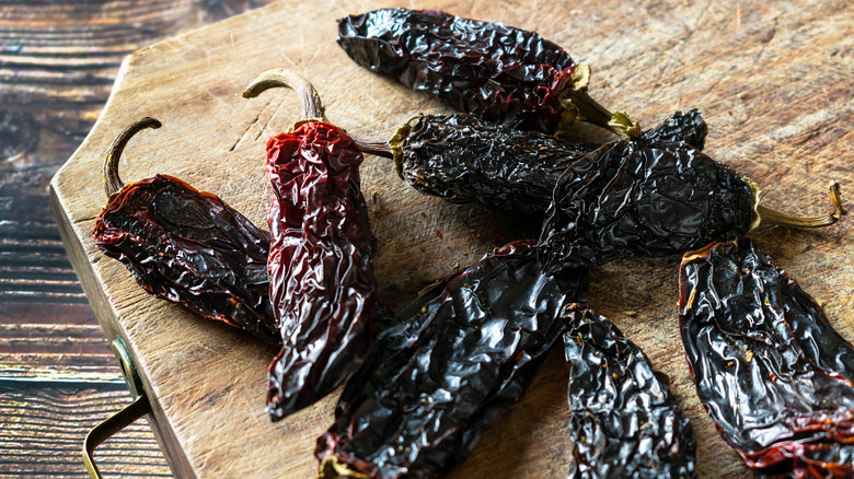 Chipotle peppers on cutting board