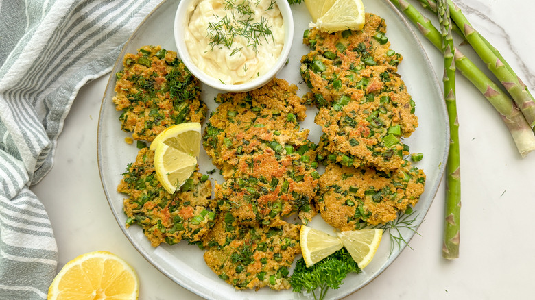 plate of fritters with sauce