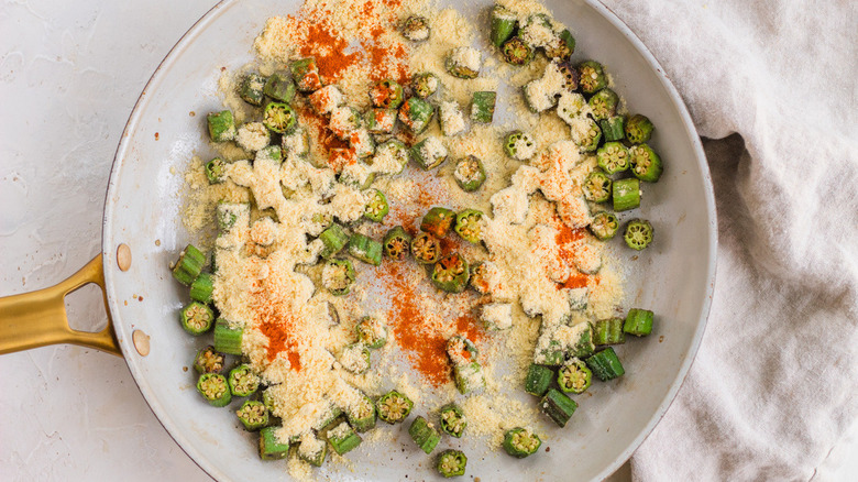 okra and cornmeal in pan