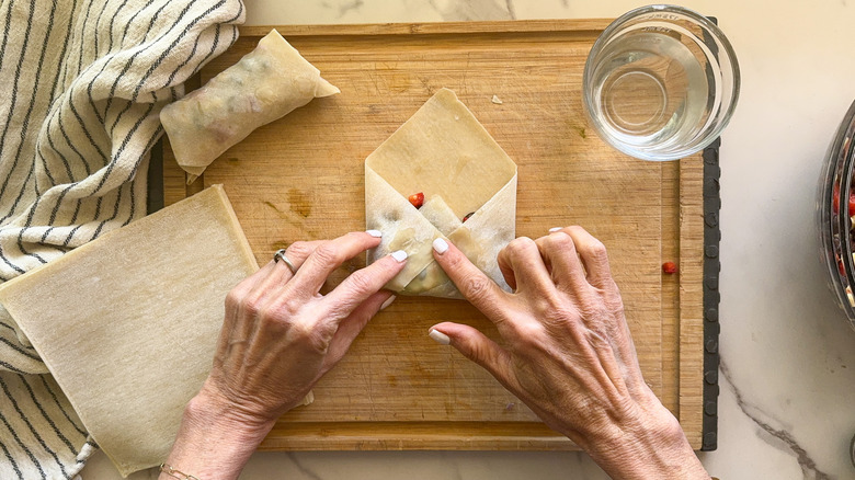 hands sealing seams