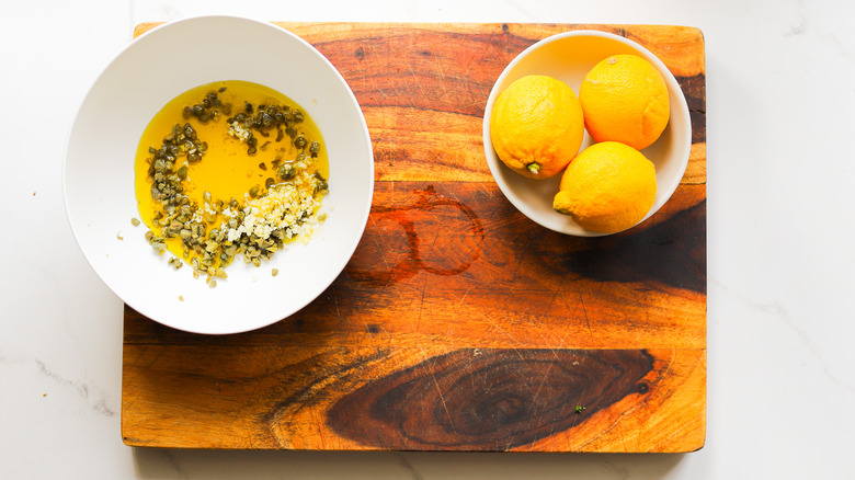 Bowl with caper and garlic mixture