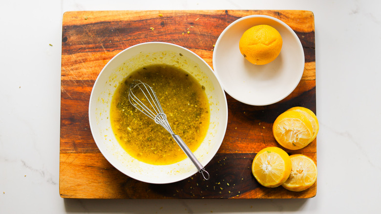 Bowl with lemon ingredients added