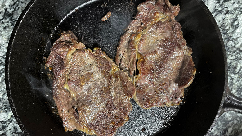 seared ribeye in skillet