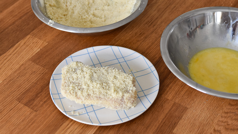 dipping pork in breading