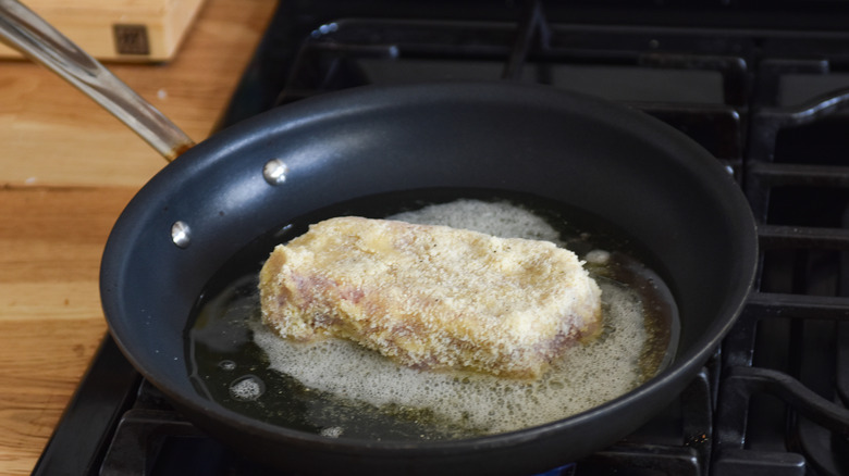 pork chops frying