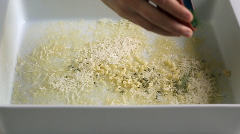 parmesan and garlic in baking dish