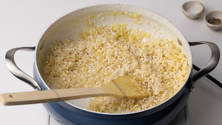 rice cooking in a large pan 