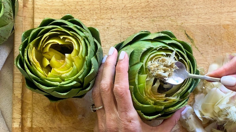 removing the hairs from artichokes