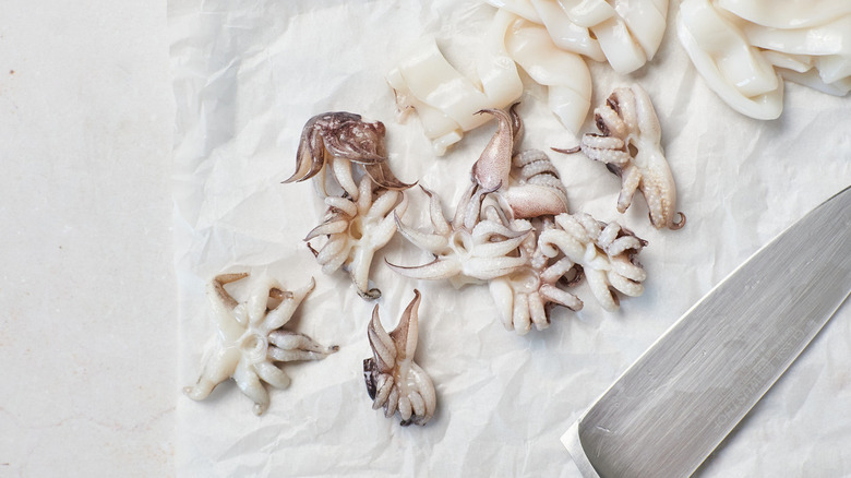 cleaning and slicing cuttlefish