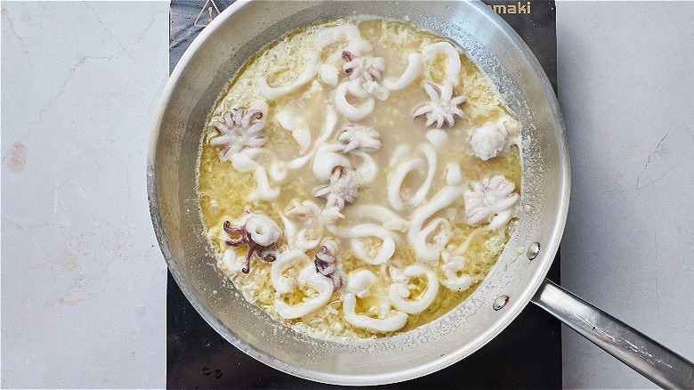 simmering cuttlefish in skillet