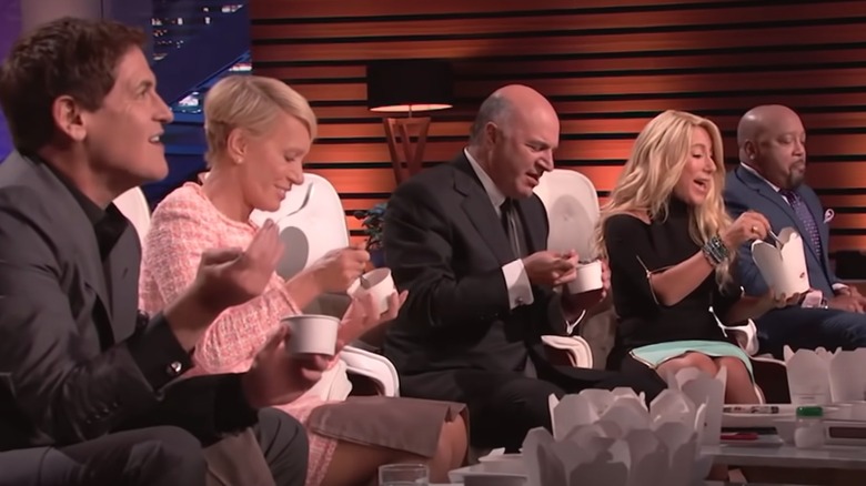 The sharks eating on "Shark Tank"