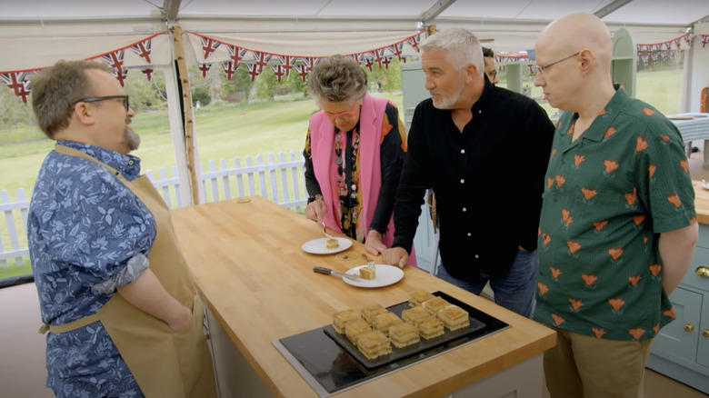 Paul Hollywood tasting cake