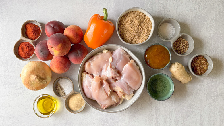 Peach bbq chicken thighs ingredients on countertop