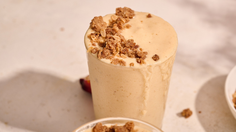 peach cobbler smoothie on table