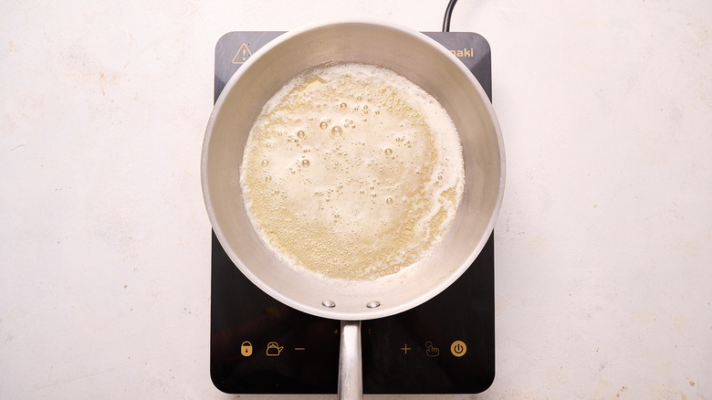 melting butter in skillet