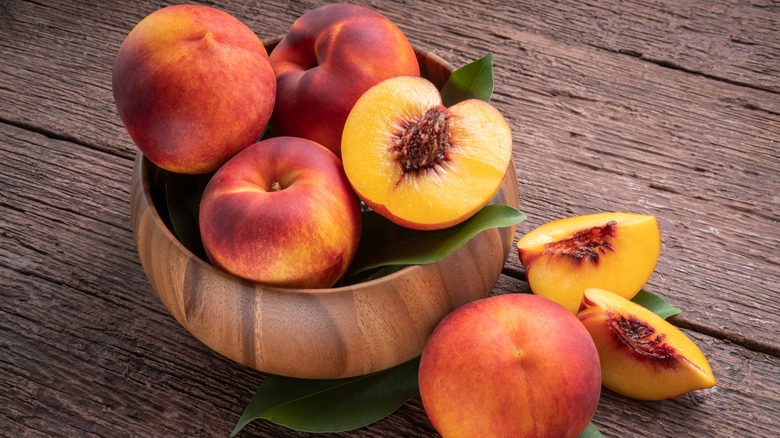 peaches against a wood background 