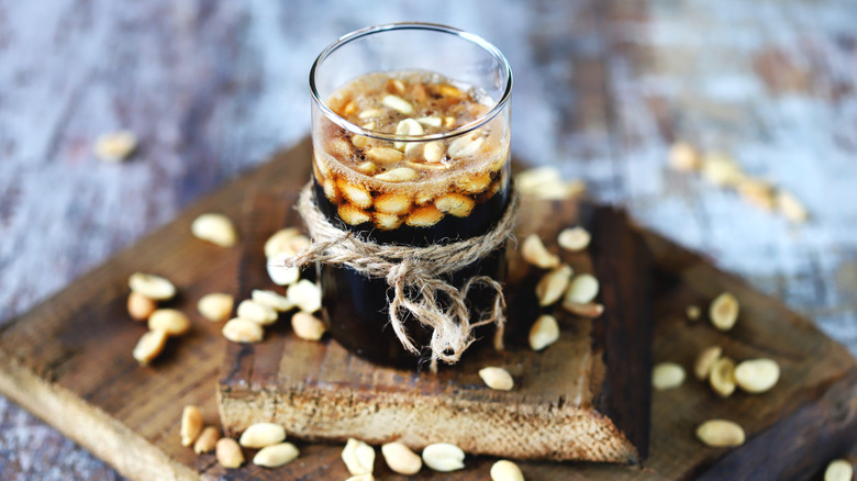 peanuts in glass with coke