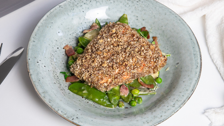 Pecan-crusted trout on plate
