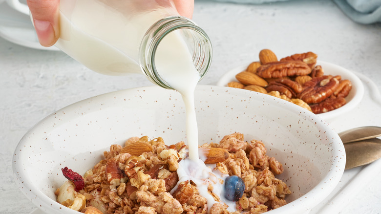 milk pouring in granola