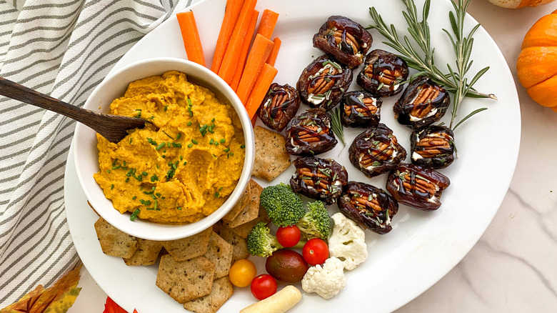 dates with hummus and vegetables