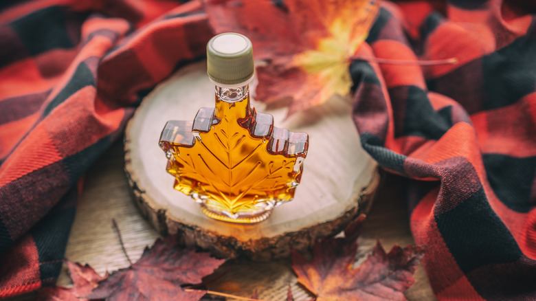 Maple syrup in glass bottle 
