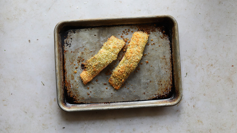 Tray with baked crusted salmon