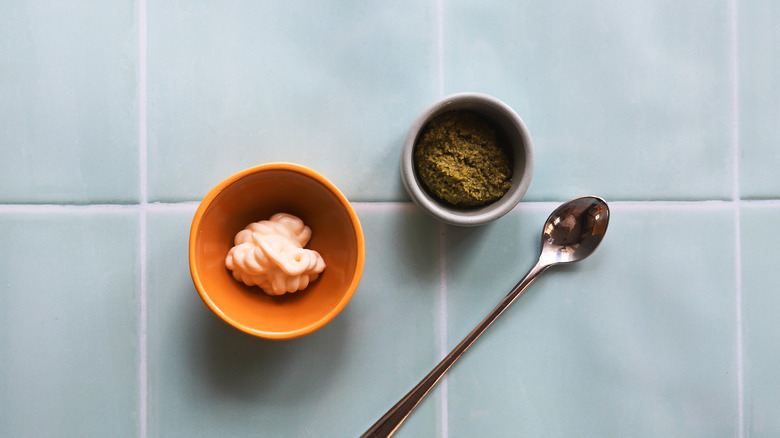 Bowls with mayo and pesto