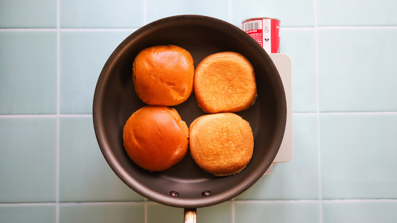 Buns toasting in nonstick pan