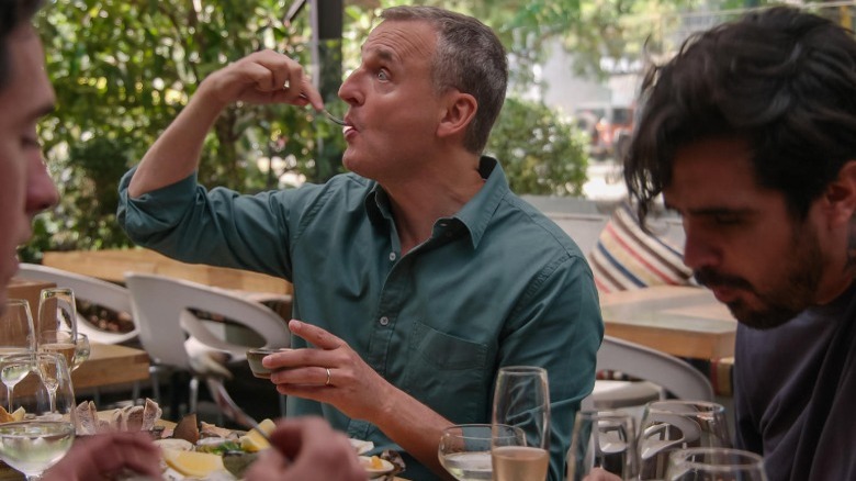 Phil Rosenthal eating at restaurant patio