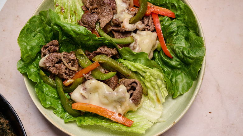 steak and cheese lettuce wraps on a plate