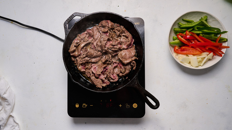 browning steak in skillet 