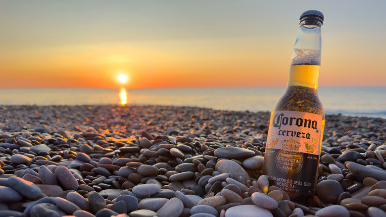 Bottle of Corona beer on beach