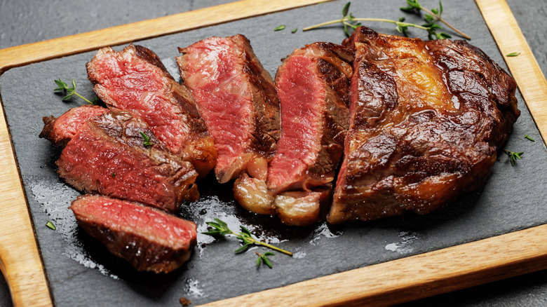 cooked sliced ribeye steak