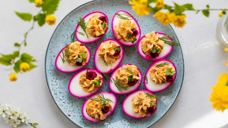 beet-pickled deviled eggs on plate