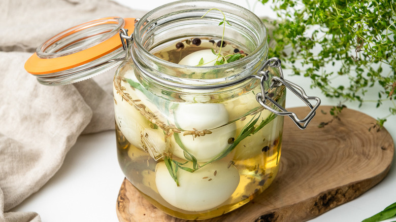 eggs infusing in herby brine