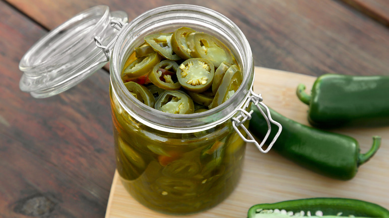 Pickled jalapeños in a jar
